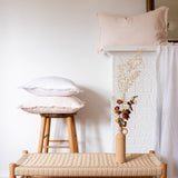 white and blush fringed lumbar pillows